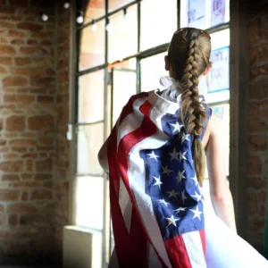 Girl with USA flag cape